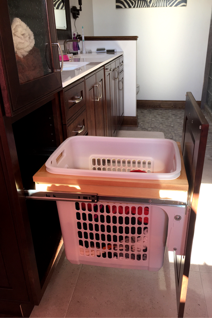 Pull out bathroom vanity cabinet drawers to be able to see what's in the back