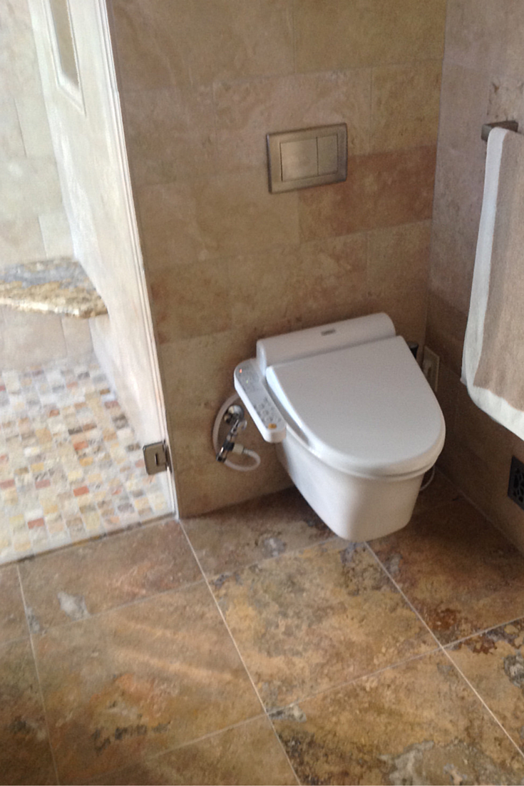 Wall mounted bidet and toilet combination from Toto called a Washlet 