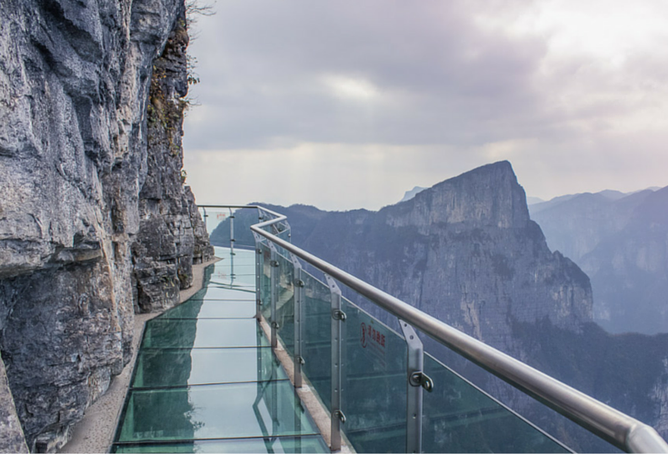 scary glass bridge on Tiananmen Mountain in China walk of faith bridge 