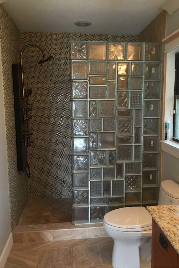 Multi patterned glass block mosaic shower wall design in Orlando Florida 