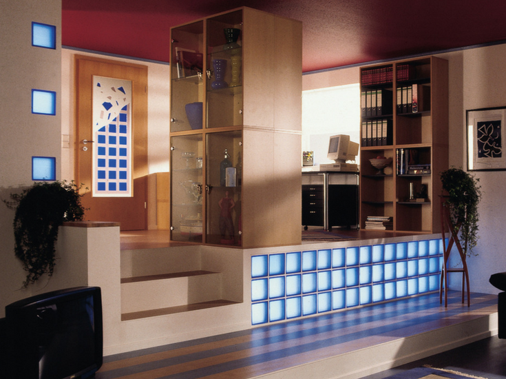 Illuminated glass block wall in a lofted apartment