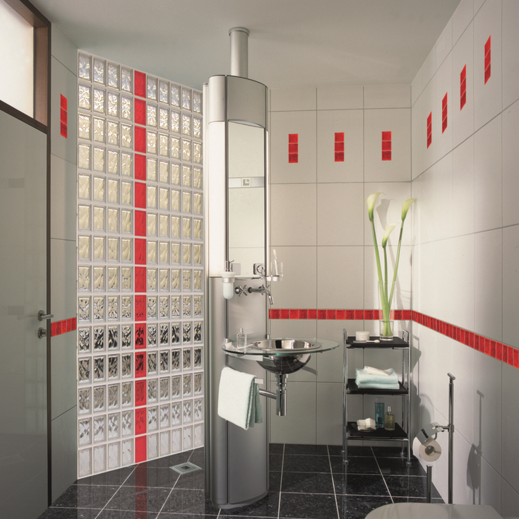 Fun red colored glass blocks in a shower wall partition in a contemporary apartment 