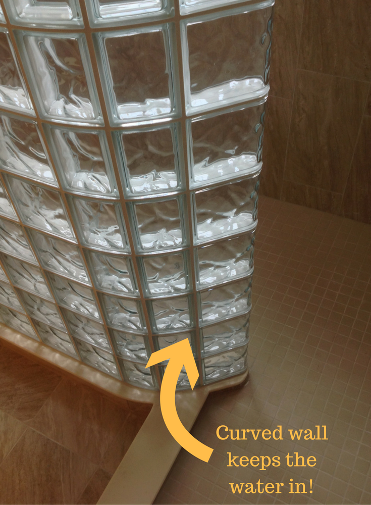 curved glass block walk in shower wall to keep water off floor | Innovate Building Solutions 