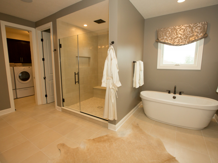 Sleek hidden drain in a tile shower floor design in Columbus Ohio 