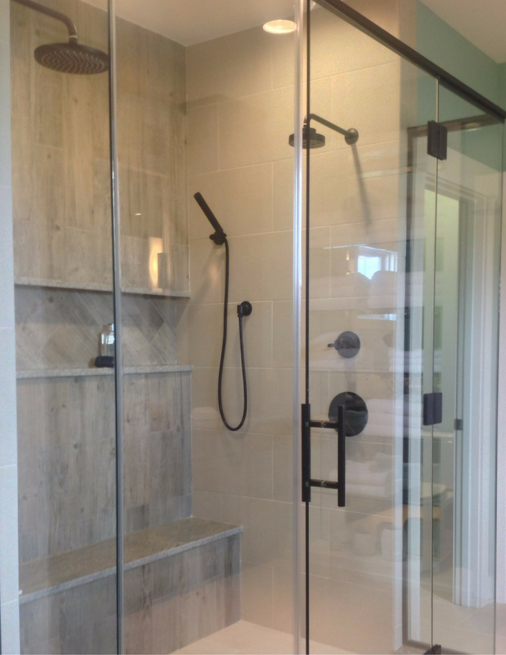 Multiple tile patterns and a niche row in an upscale shower in Columbus Ohio 