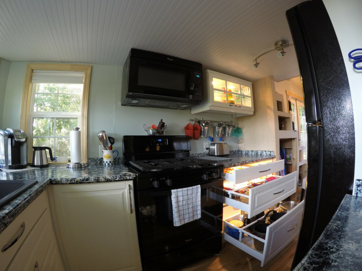 fully extension pull out drawers in a tiny home kitchen in north carolina 