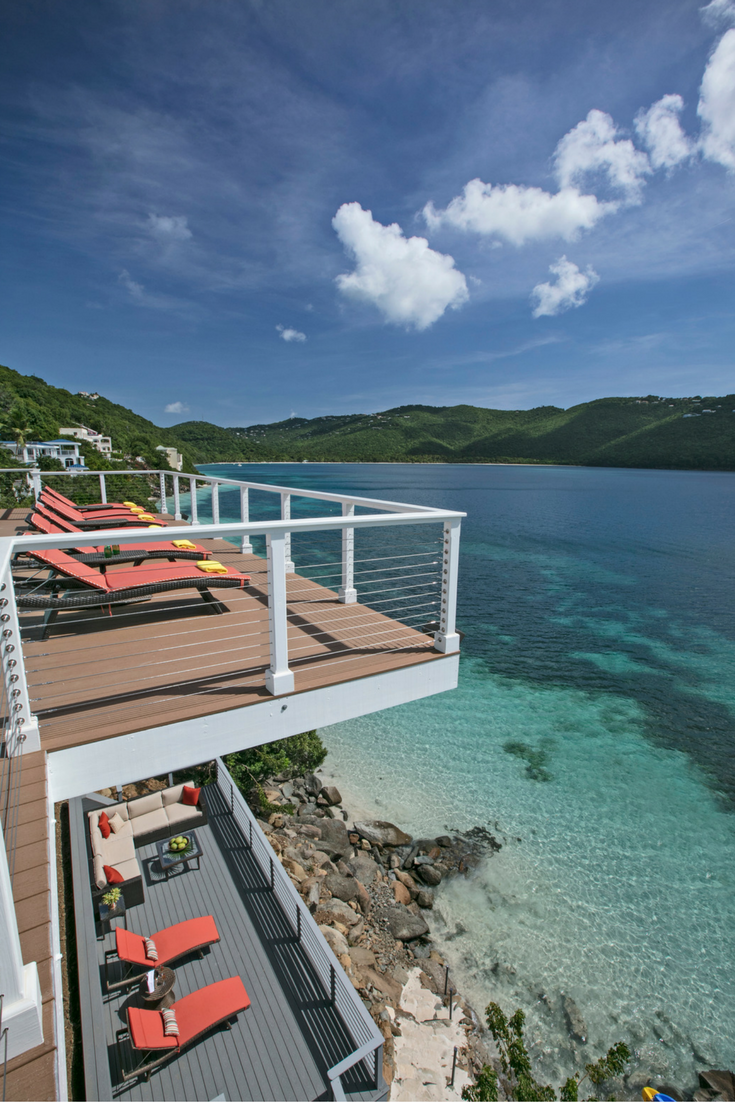 A cantilivered contemporary deck in a St. Thomas vacation home on Magen's Bay - @InnovateBuild