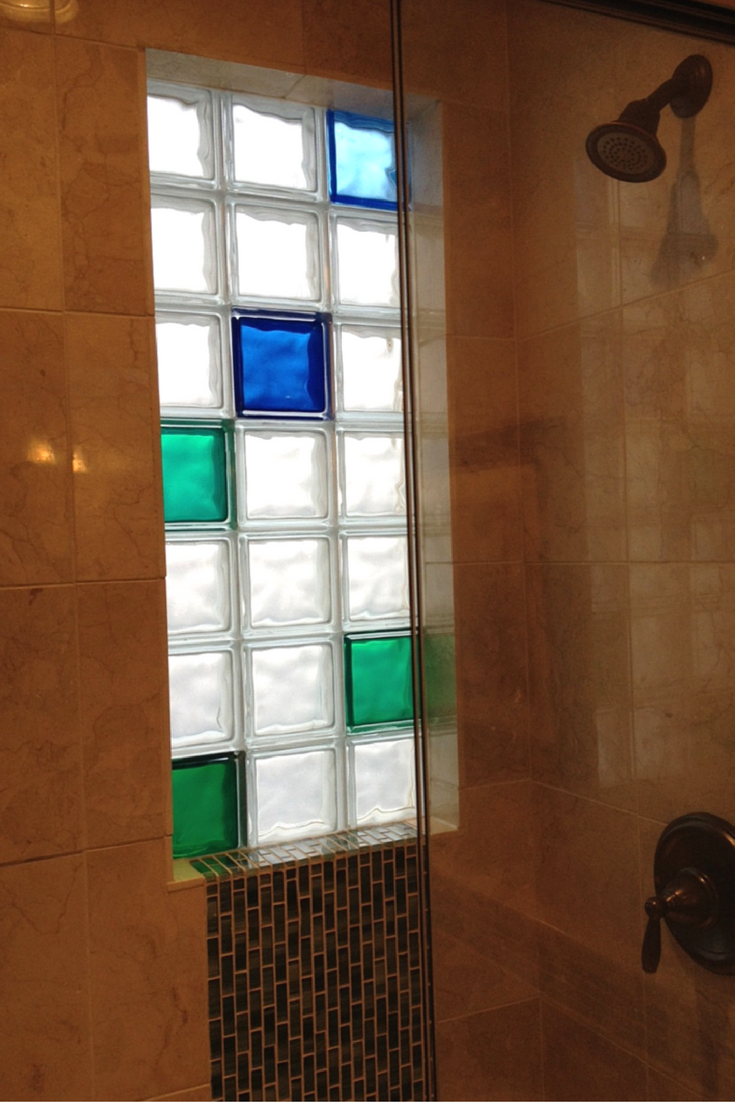 Multi-colored glass block shower window with green and blue glass blocks from Innovate Building Solutions 