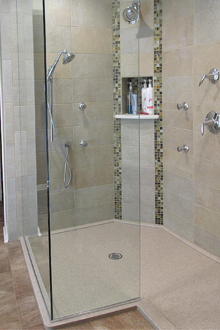 A custom sized cultured granite shower pan with tile surround walls | Innovate Building Solutions