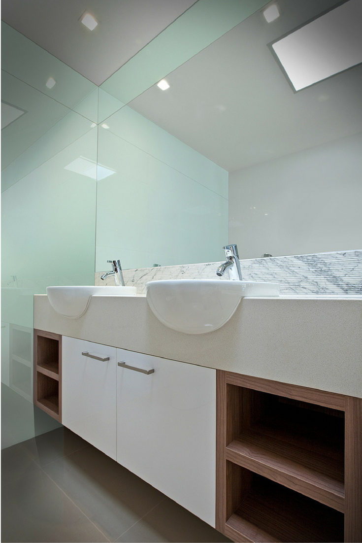 Glacier colored high gloss bathroom and shower wall panels for easy maintenance and reduced cost vs. back painted glass. | Innovate Building Solutions 