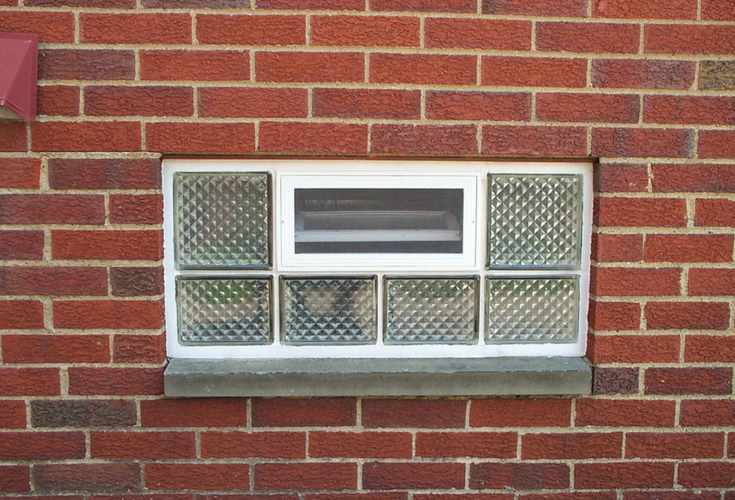 Diamond pattern glass block window with an air vent for ventilation | Innovate Building Solutions