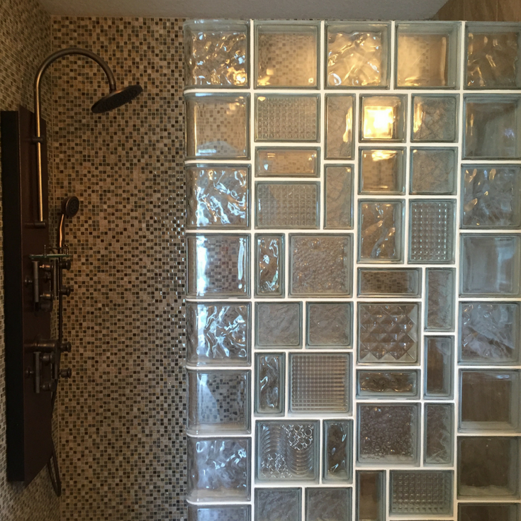 Leaded glass looking glass block shower wall with different patterns and sizes for a unique design - Innovate Building Solutions 