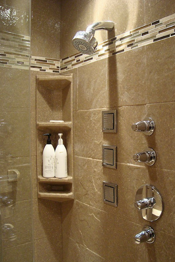 Solid surface shower wall panels with a tile border add style and lower maintenance costs. | Innovate Building Solutions