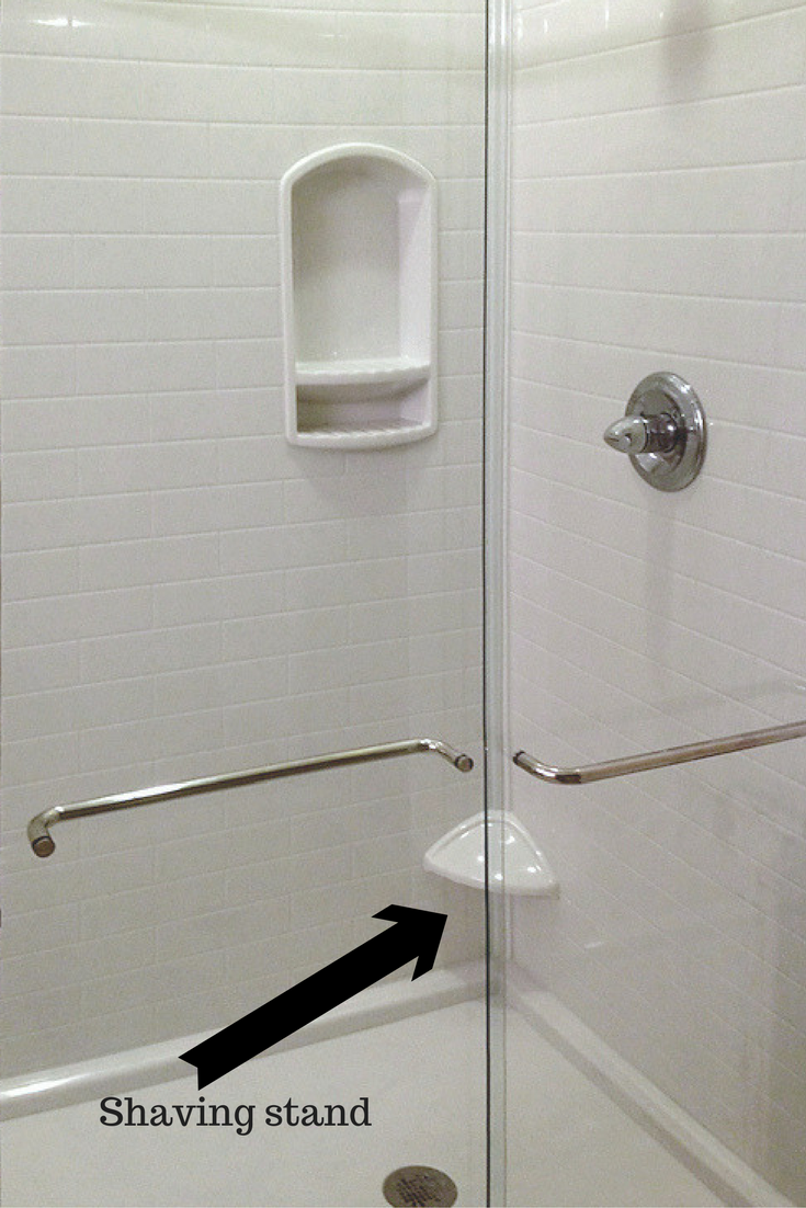 Small leg ledge for shaving in a solid surface subway tile pattern shower system - Innovate Building Solutions 