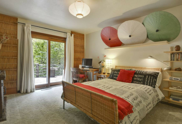 A Japanese inspired bedroom with fun looking umbrellas in a vacation rental home in Cazadero California - Innovate Building Solutions