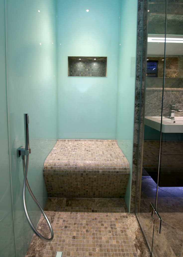 Glacier colored high gloss acrylic shower wall surround panels and ceramic tile shower pan | Innovate Building Solutions