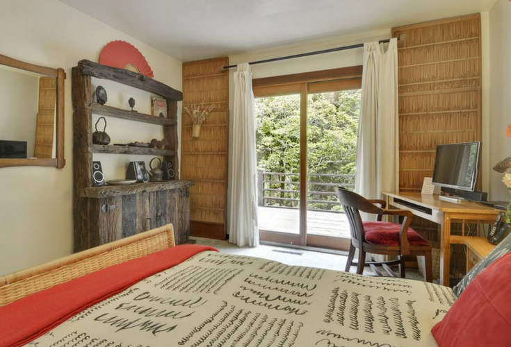 Rustic hand made dresser is a fun piece in this vacation home rental property called Sequoia Beach Dreamery in Cazadero California - Innovate Building Solutions 