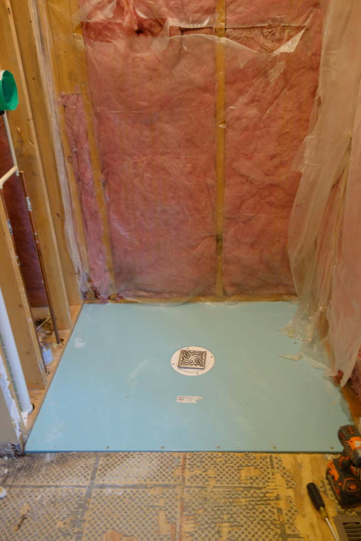 Bathroom remodeling project with one level shower pan for a wheelchair accessible bathroom | Innovate Building Solutions 