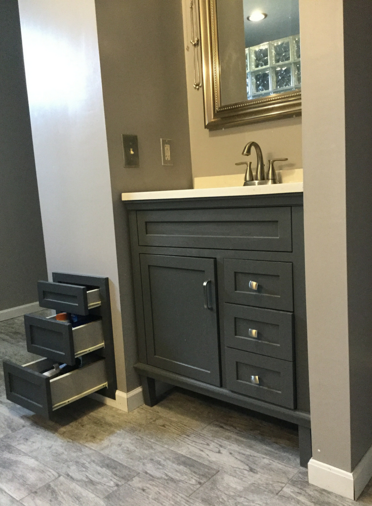 Custom drawers in a DIY bathroom remodel in Columbus Ohio to use space wisely in a drywall wall | Innovate Building Solutions 