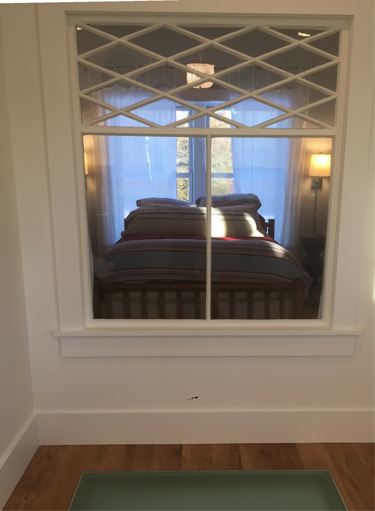 Ornate modern farmhouse salvage window after installation in a sustainable energy efficient custom Connecticut home | Innovate Building Solutions