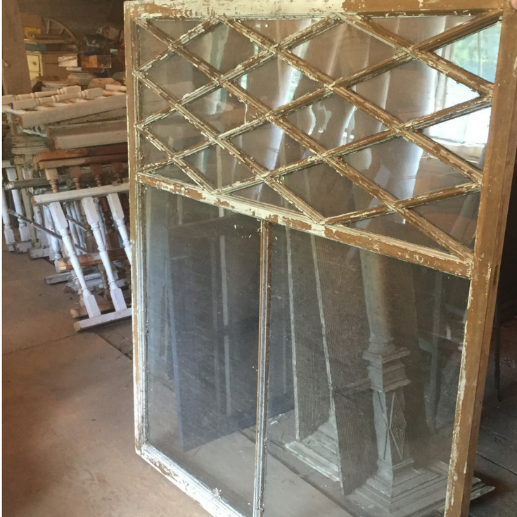 Ornate salvage window in a modern farmhouse before installation | Innovate Building Solutions 