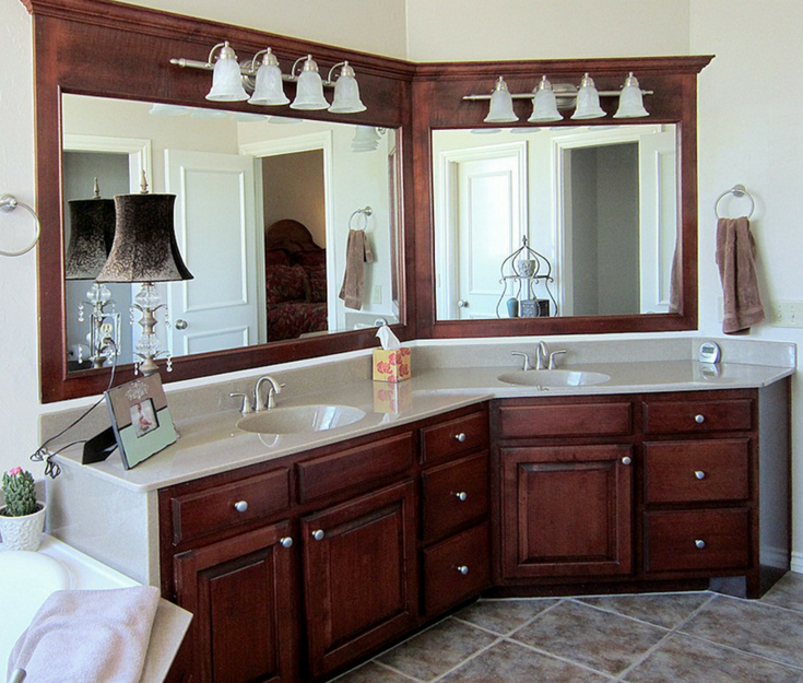 Custom solid surface bath vanity top in a traditional bathroom can be made to any size or shaped space | Innovate Building Solutions 