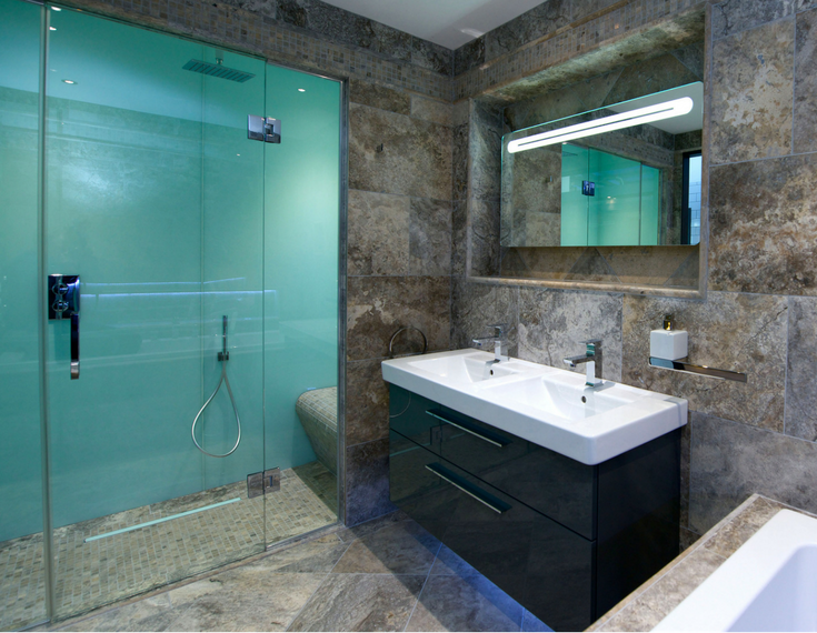 Glacier colored high gloss acrylic shower wall panels in bathroom remodel with a ceramic floor | Innovate Building Solutions 