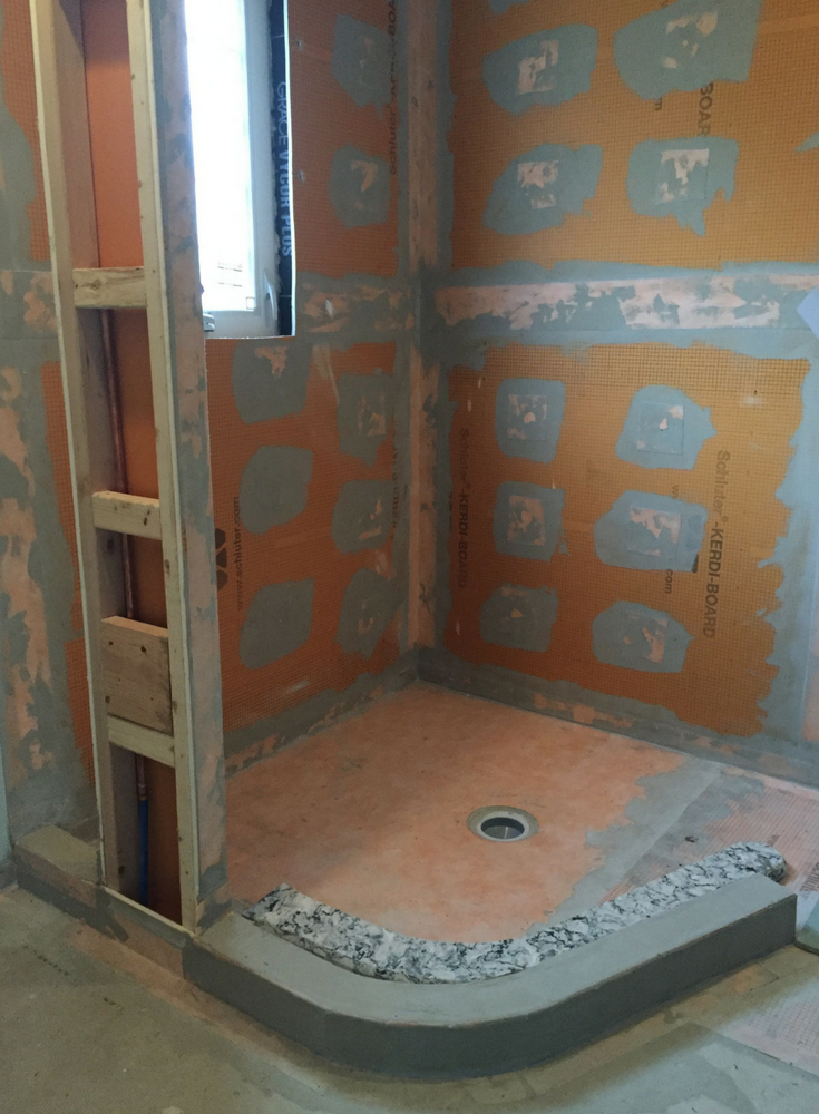 Kerdi tile waterproofing system installed before a glass block shower is installed in a New Jersey small bath remodeling project | Innovate Building Solutions