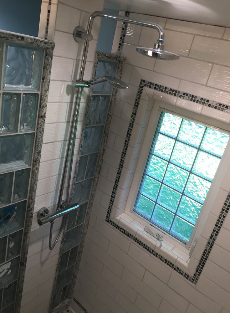 Casement style high privacy acrylic block window in a tile shower with decorative glass block walls | Innovate Building Solutions 