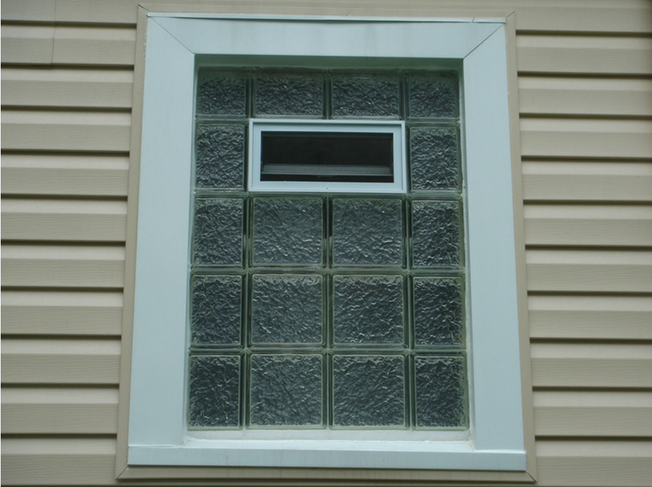 Protect all glass block bathroom window in a high privacy Icescapes pattern with an air vent | Innovate Building Solutions 