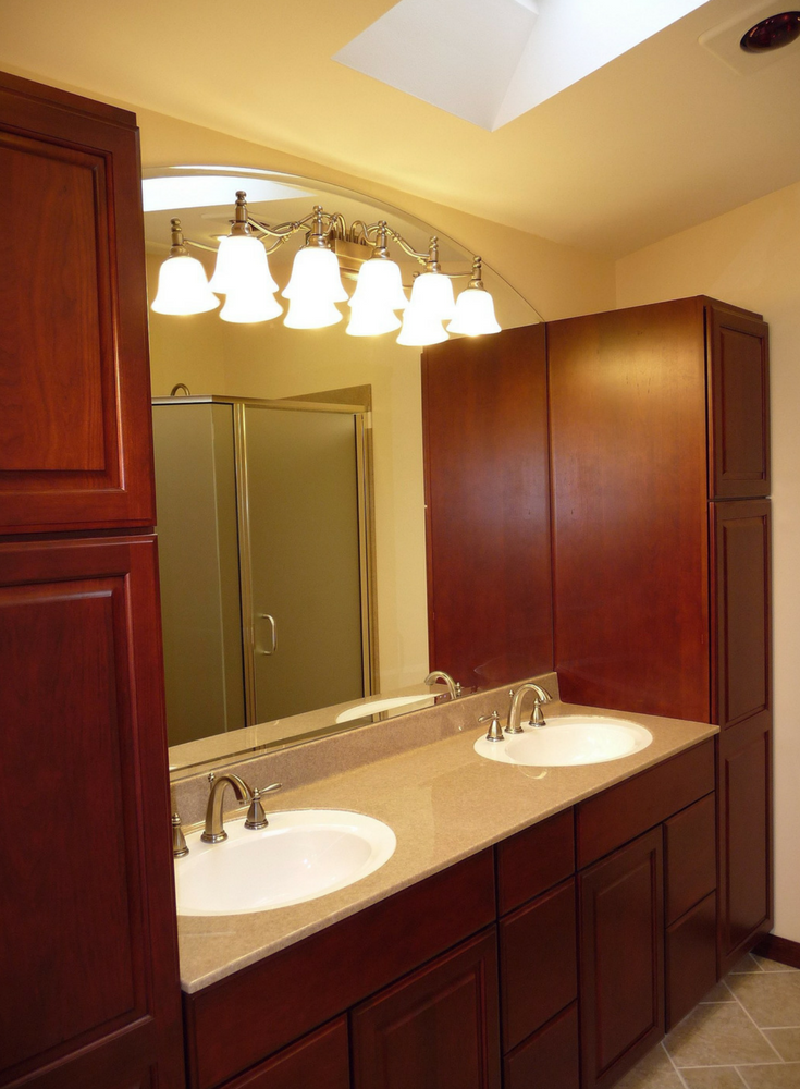 Solid surface custom bath vanity top with a different bowl and top color | Innovate Building Solutions