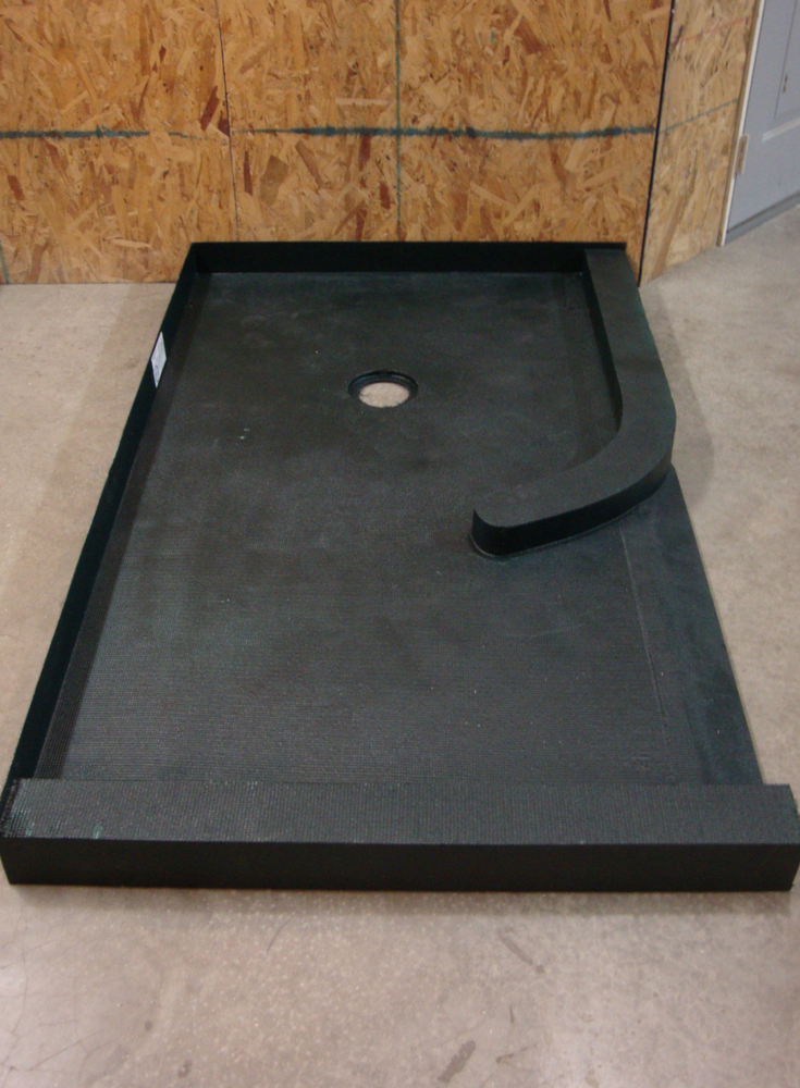 Lightweight ready for tile shower pan with a curved curb before installation | Innovate Building Solutions 