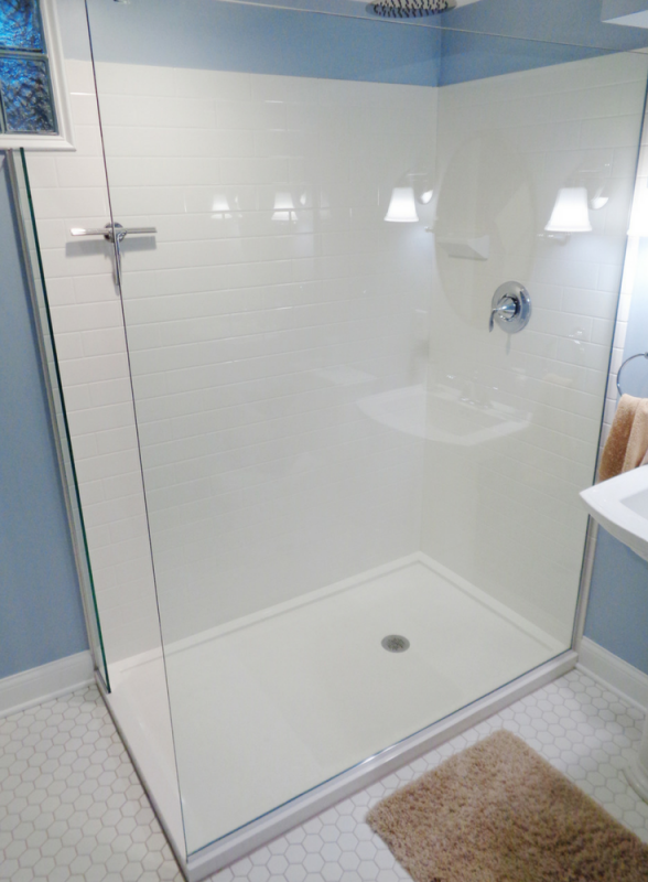 How to choose between a solid surface or ready for tile shower pan for