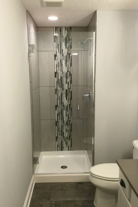 How to Remodel a Boring White Builders Grade Shower Surround on A Budget