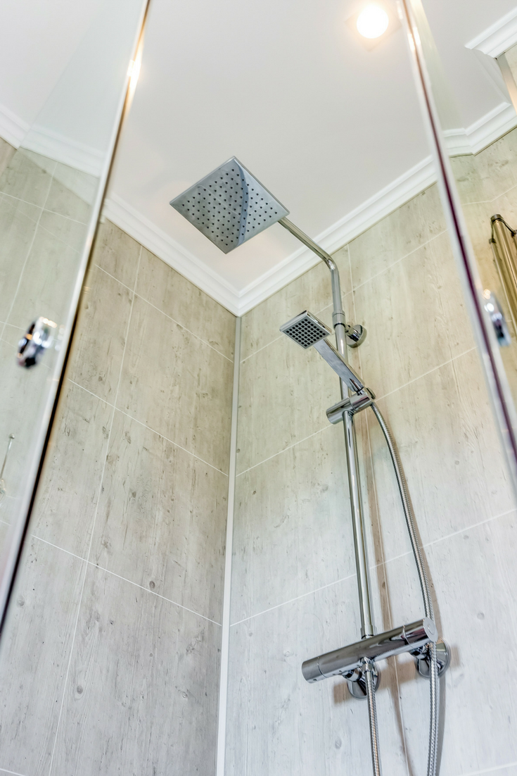 Waterproof laminate wall panels faux tile look | Innovate Building Solutions #ShowerPanels #DIYPanels #DIY #DIYShower