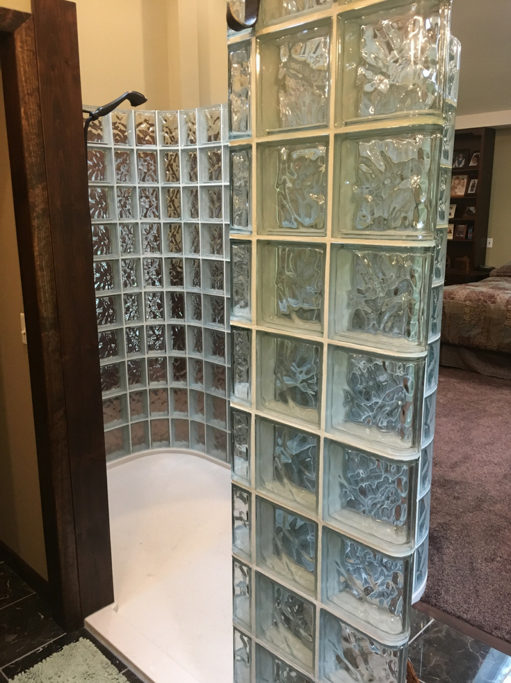 Glass Block Wall on Onyx base after installation | Innovate Building Solutions | #GlassBlockWall #GlassBlockShower #ShowerWall