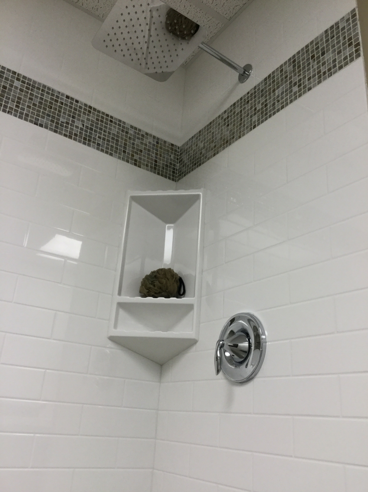 How to Compare Solid Surface & Cultured Stone Shower Systems