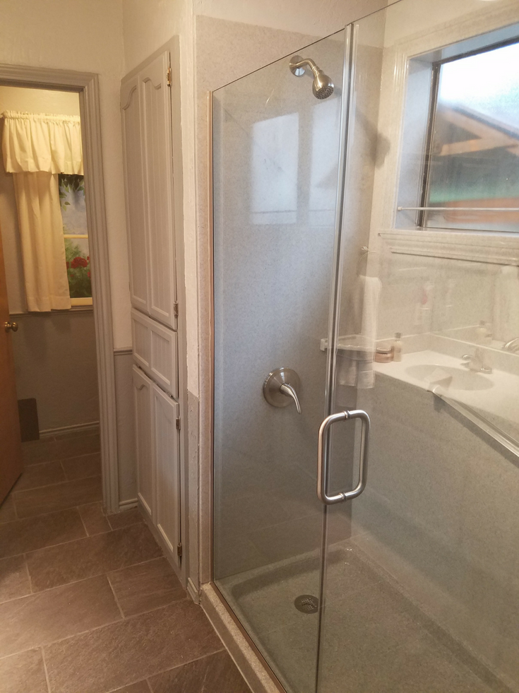 How to Compare Solid Surface & Cultured Stone Shower Systems