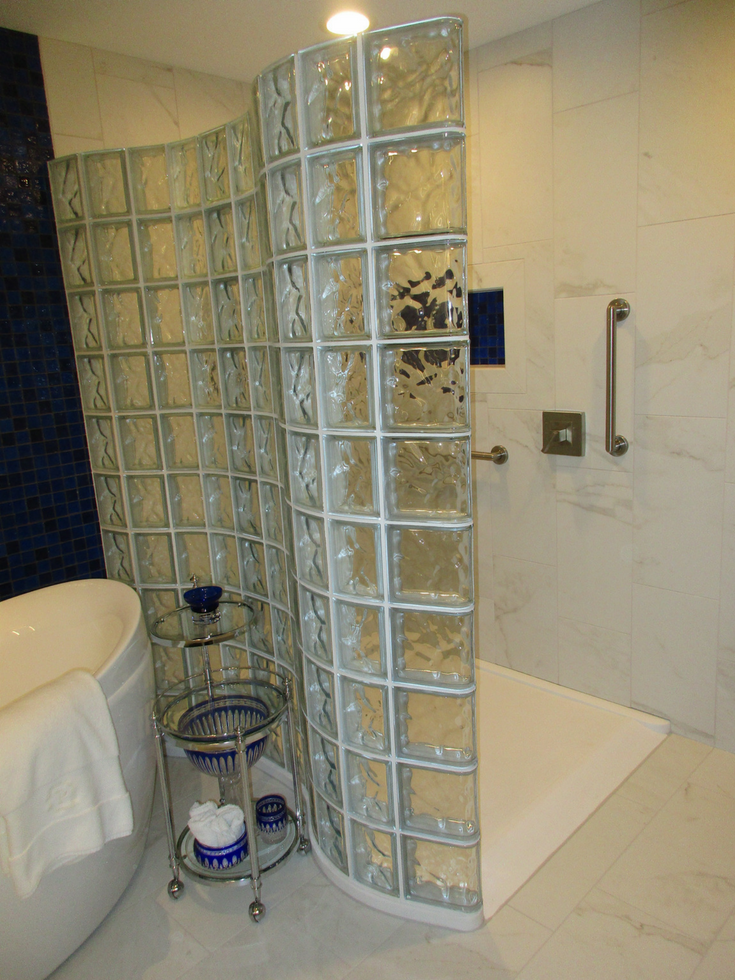 Rampled Solid Surface Shower Pan | Innovate Building Solutions | #ShowerPan #SolidSurface #ShowerBase