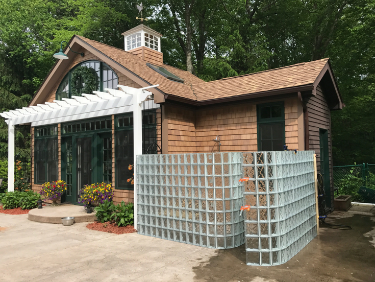 Pool house glass block shower | Innovate Building Solutions | #OutdoorShower #GlassBlockShower #GlassBlockWall