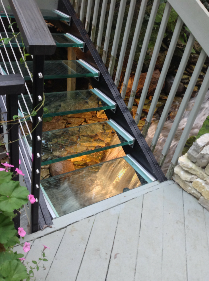 Water running under glass treads A McClure | Innovate Building Solutions | #GlassStairs #StructuralGlass #BeautifulGlass