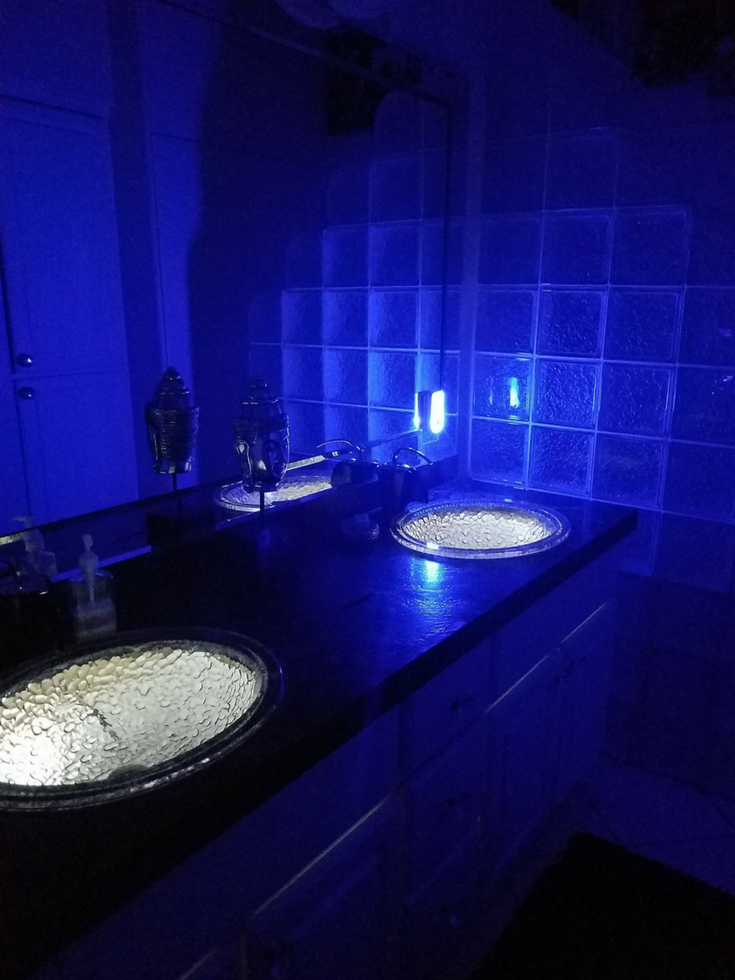 Glass sinks with LED lighting underneath | Innovate Building Solutions | #GlassSink #LEDlights #BathroomRemodel