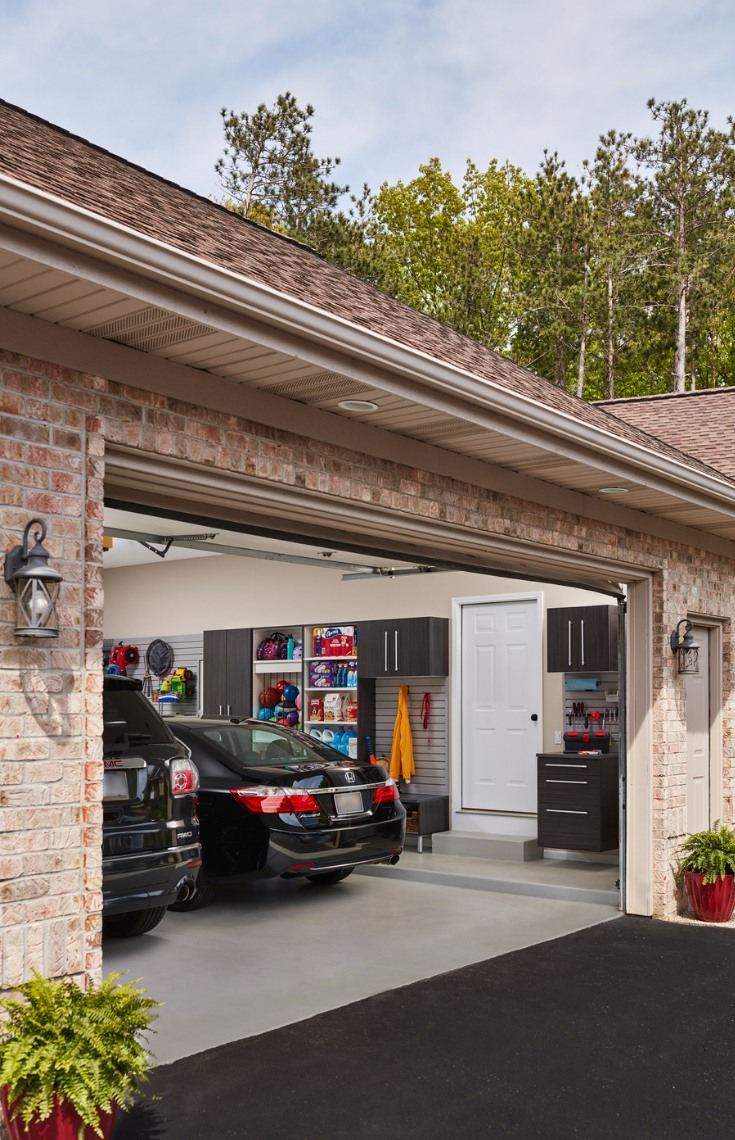 An organized garage storage system | Innovate Building Solutions | #OrganizedGarage #GarageStorage #GarageCabinets