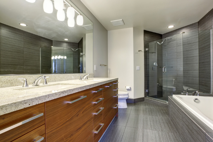 Engineered wood flooring in a bath remodel | Innovate Building Solutions | #BathroomFlooring #EngineeredWood #BathroomRemodel