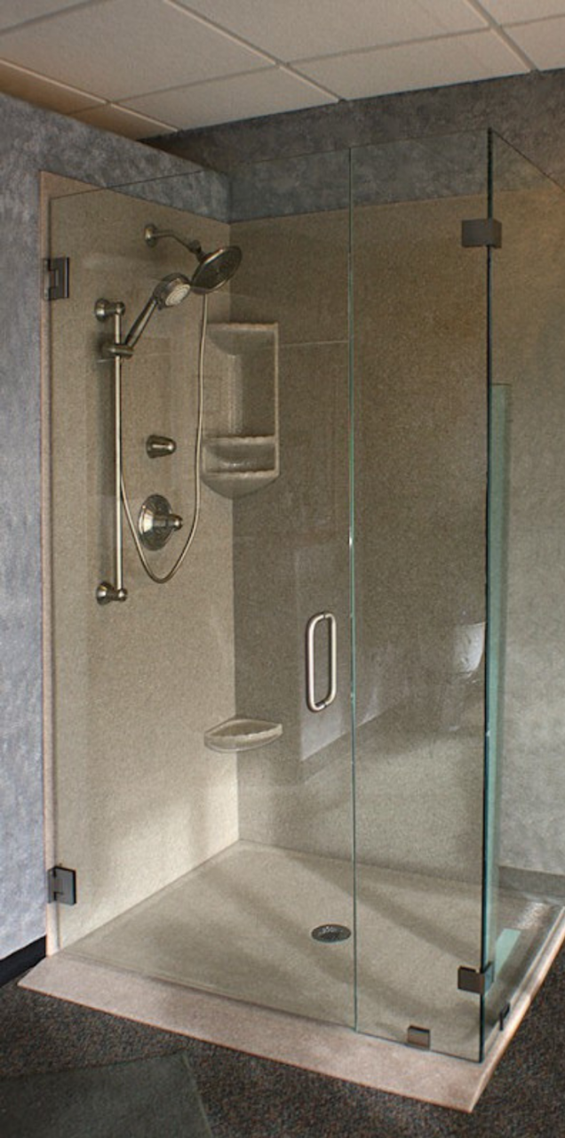 Solid surface pan with a ramp extension kit | Innovate Building Solutions | #SolidSurface #RollInShower #ShowerRamp