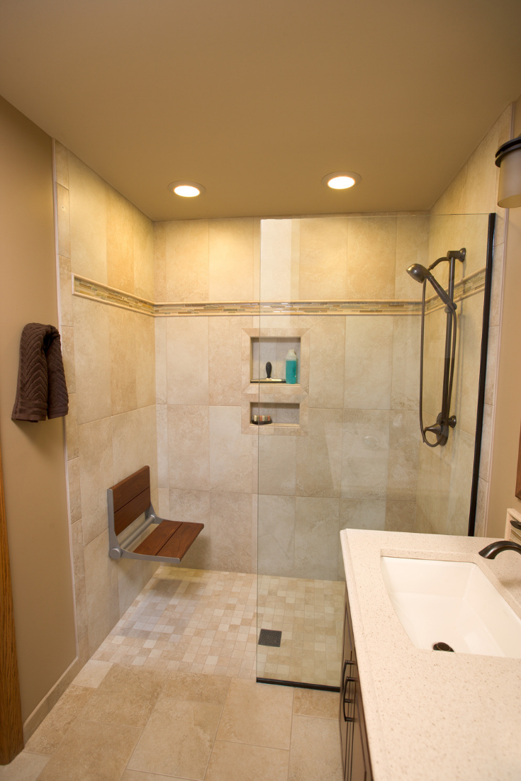 Large wall tiles in a one level wet room | Innovate Building Solutions | #LargeTiles #TiledShower #BathroomRemodelDIY