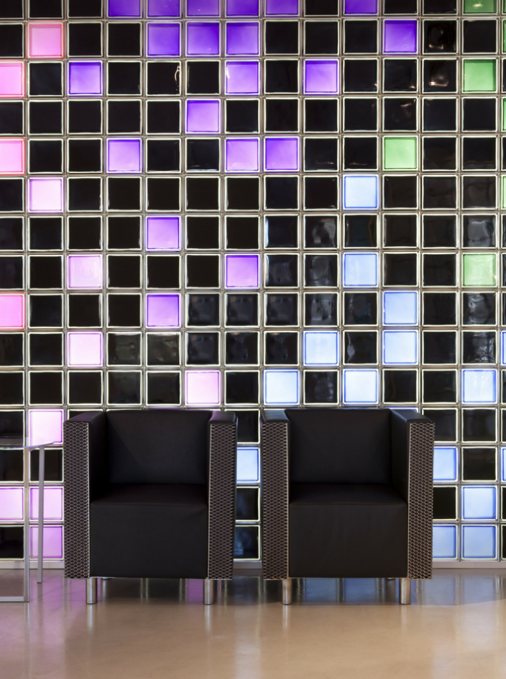 Random colored glass blocks in a glass block wall | Innovate Building Solutions | #ColorGlassBlock #GlassBlockWall #GlassBlockDesign