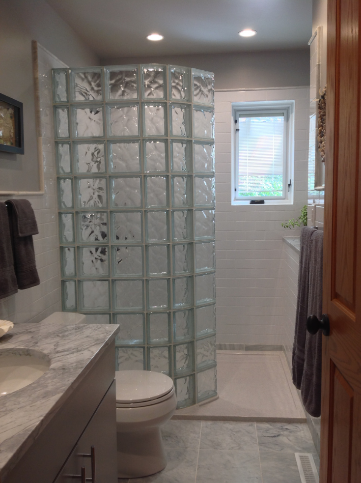 Walk in shower for bathroom remodel | Innovate Building Solutions | #CurvedGlassBlockWall #ShowerDesign #PrefabGlassBlock