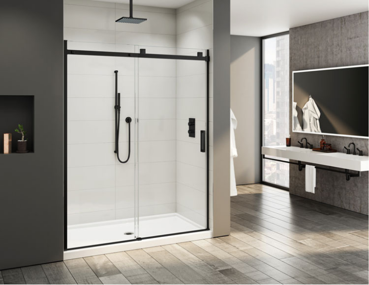 Matte black shower enclosure | Innovate Building Solutions | #ShowerEnclosure #MatteBlackShower #BathroomRemodelingIdeas #BlackWallPanels