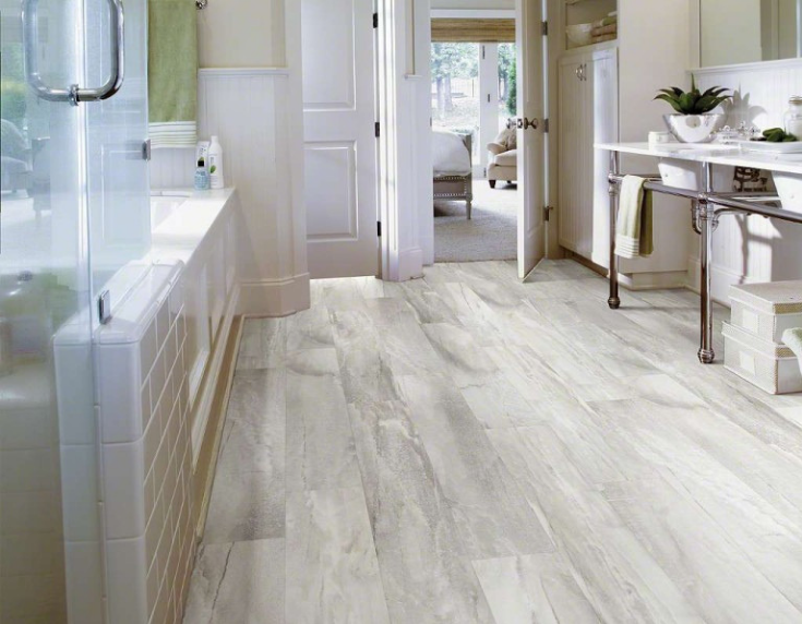 Whitewashed laminate bathroom flooring www.attagirlsays.com | Innovate Building Solutions | #AttaGirlSays #LaminatePanels #bathroomWallPanels #RusticBathroom 